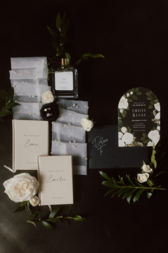 A wedding flat lay using Catherine Rose Original floral  pieces